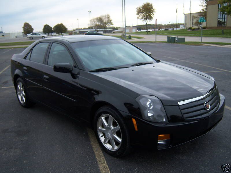 Blacked out lights Cadillac Owners Forum